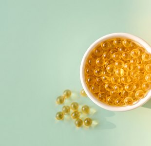 rundes Bild: Vitamin-D3-Kapseln in der Sonne